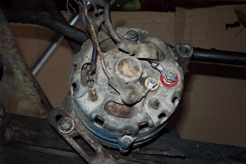 Here's a filthy alternator ready to be restored.  I sent it out for cleaning and rebuilding.