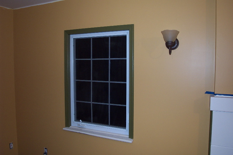 Living room window is trimmed in.  The sill still needs to be stripped.