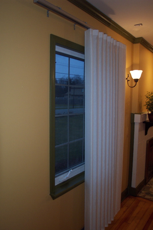 New blinds and painted sill finish the window.