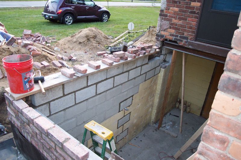 ... and a new layer of blocks and bricks on the top make it look like a porch again.